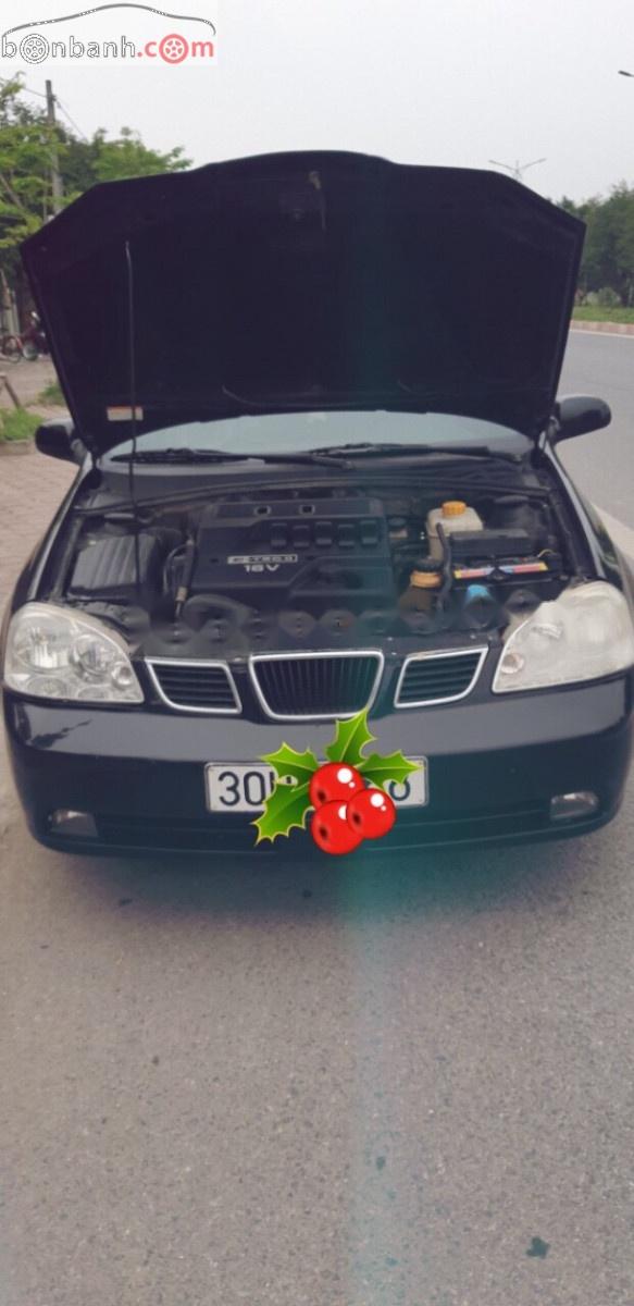 Daewoo Lacetti EX 2010 - Cần bán lại xe Daewoo Lacetti EX 2010, màu đen, xe gia đình