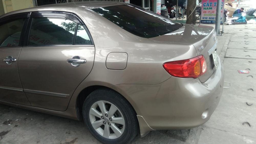 Toyota Corolla altis G 2010 - Bán ô tô Toyota Corolla altis G sản xuất năm 2010, màu vàng