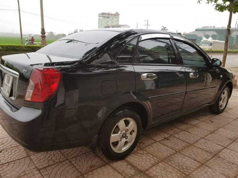 Chevrolet Lacetti EX 2010 - Bán Chevrolet Lacetti EX 2010, màu đen, xe gia đình 