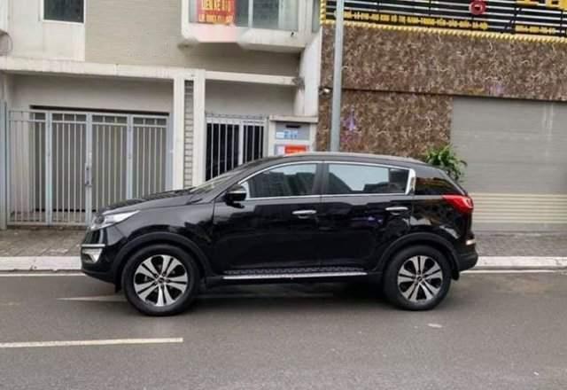 Kia Sportage TXL 2.0AT 2010 - Bán lại xe Kia Sportage TXL 2.0AT 2010, màu đen số tự động