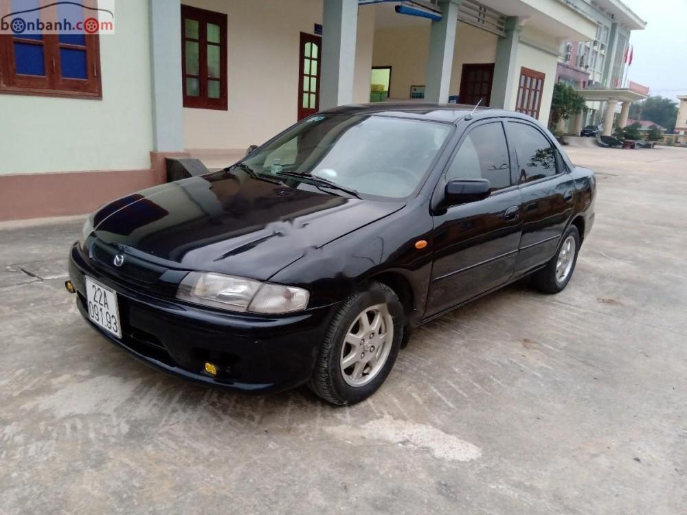 Mazda 323 GLXi 1.6 MT 2000 - Bán Mazda 323 2000, còn tương đối nguyên bản