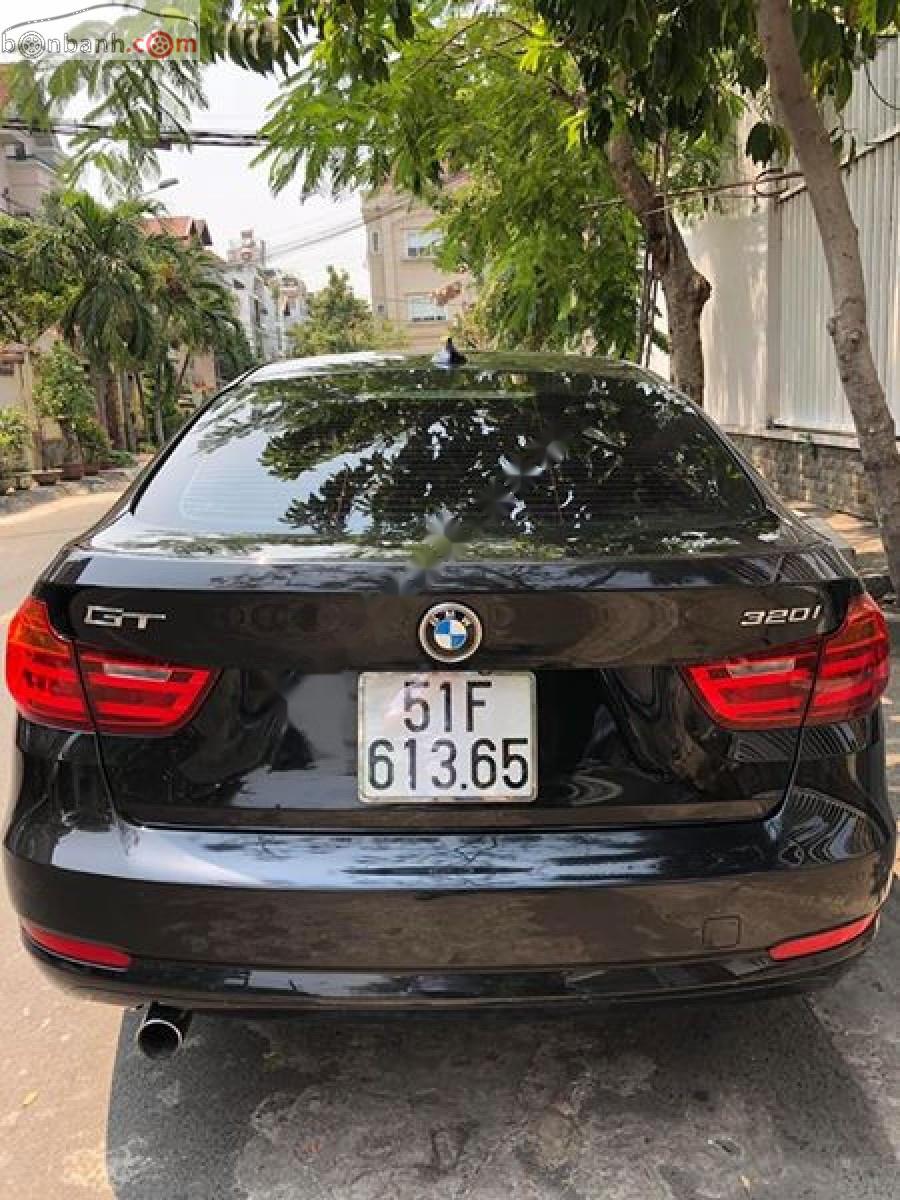 BMW 3 Series 320i GT 2014 - Cần bán BMW GT 320i sản xuất 2014, lăn bánh 2016