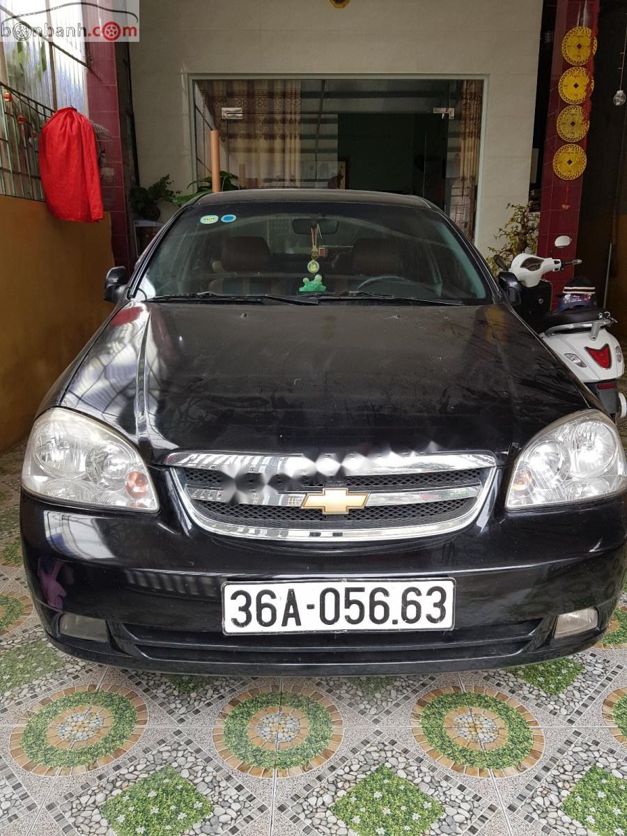 Daewoo Lacetti EX 2005 - Cần bán Daewoo Lacetti Ex đời 2005, màu đen, xe gia đình sử dụng nên rất giữ xe