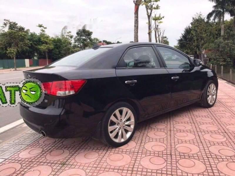 Kia Forte 2010 - Bán Kia Forte đời 2010, màu đen, nhập khẩu nguyên chiếc số sàn