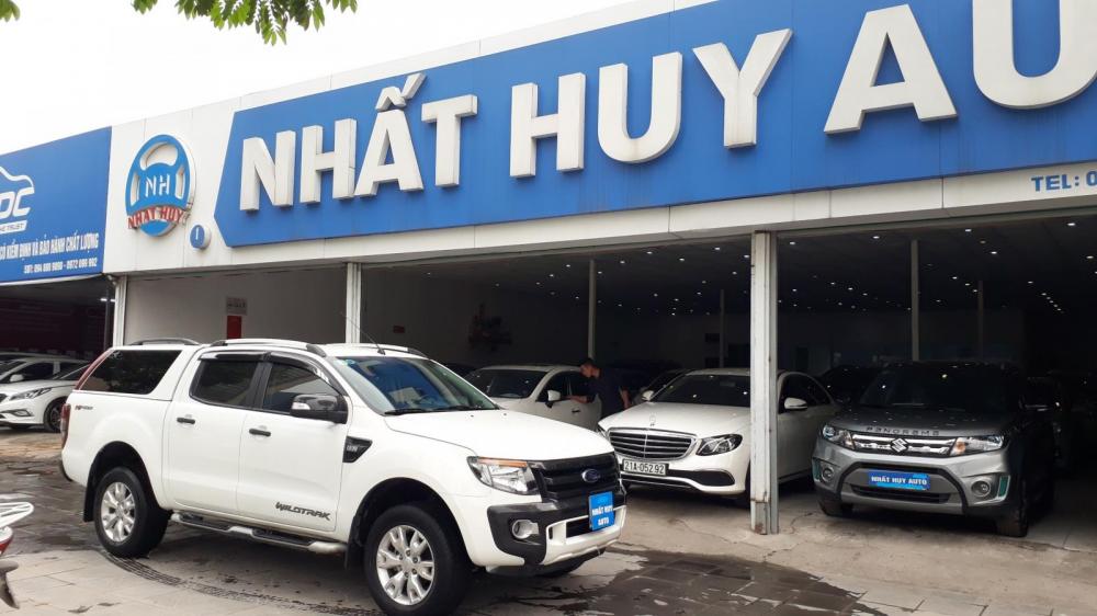 Ford Ranger Wildtrak 2.2 AT 4X2 2014 - Bán ô tô Ford Ranger Wildtrak 2.2 AT 4X2 đời 2014, màu trắng, xe nhập, giá tốt