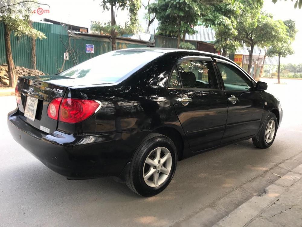 Toyota Corolla altis G 2003 - Cần bán lại xe Toyota Corolla altis G đời 2003, màu đen chính chủ 