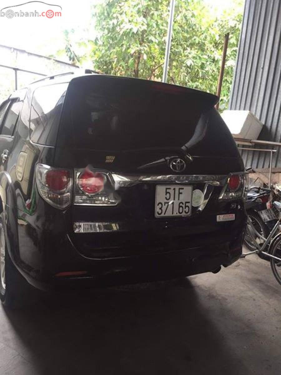 Toyota Fortuner 2.5G 2012 - Cần bán gấp Toyota Fortuner 2.5G đời 2012, màu đen số sàn