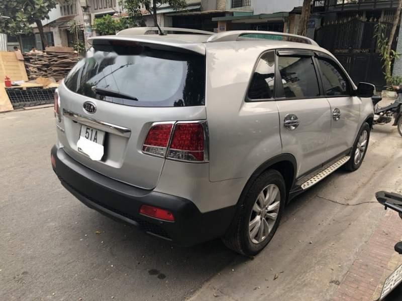 Kia Sorento   2.4L  2013 - Bán Kia Sorento 2.4L đời 2013 số tự động, màu bạc xe gia đình sử dụng kỹ nên còn khá mới