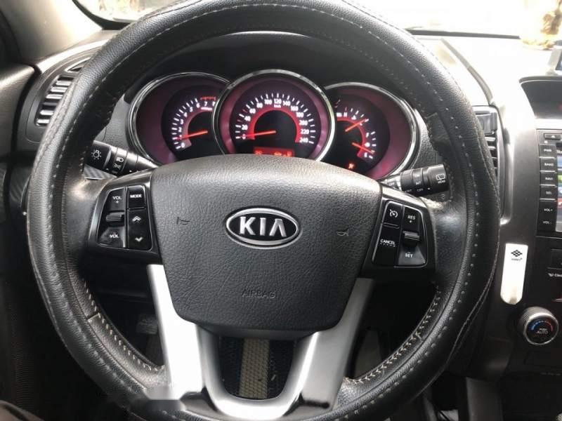 Kia Sorento   2.4L  2013 - Bán Kia Sorento 2.4L đời 2013 số tự động, màu bạc xe gia đình sử dụng kỹ nên còn khá mới