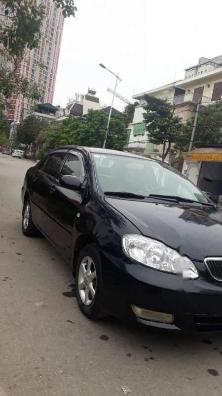 Toyota Corolla altis   MT 2003 - Gia đình bán xe Toyota Corolla Altis MT năm 2003, màu đen