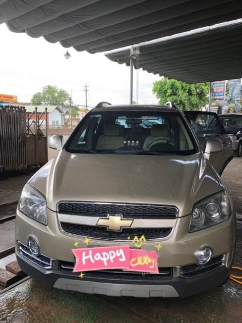 Chevrolet Captiva   2010 - Cần bán Chevrolet Captiva năm sản xuất 2010, màu vàng như mới