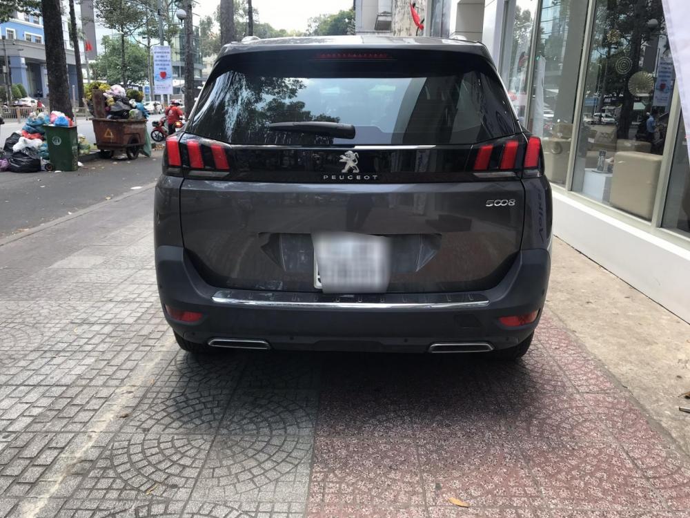 Peugeot 5008 2017 - Tôi bán Peugeot 5008 đăng ký 1/2018, mới đi 24.000, màu xám nam tính, còn fix