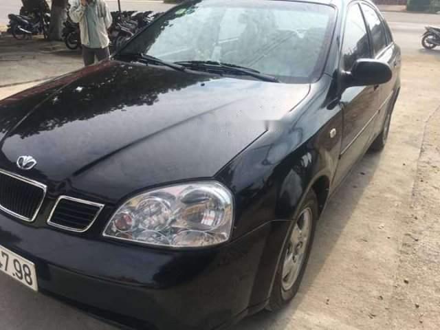 Daewoo Lacetti MT 2004 - Cần bán xe Daewoo Lacetti MT đời 2004, màu đen, giá tốt