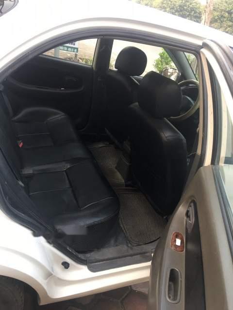 Kia Spectra MT 2004 - Cần bán Kia Spectra MT năm 2004, màu trắng, giá chỉ 105 triệu