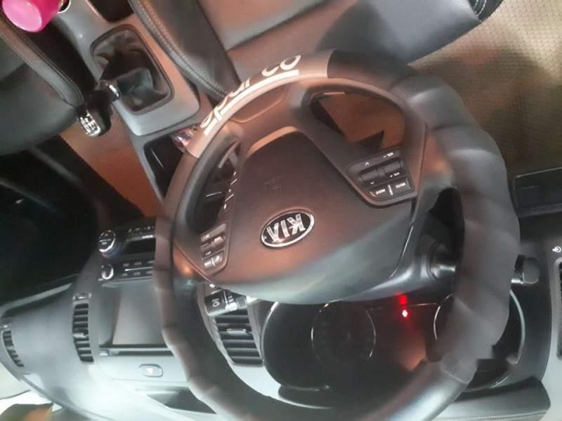 Kia K3 MT 2014 - Bán Kia K3 MT 2014, màu trắng giá cạnh tranh