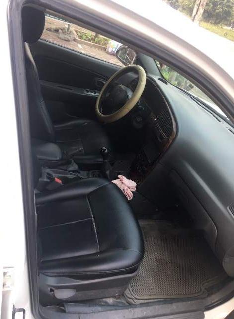 Kia Spectra MT 2004 - Cần bán Kia Spectra MT năm 2004, màu trắng, giá chỉ 105 triệu