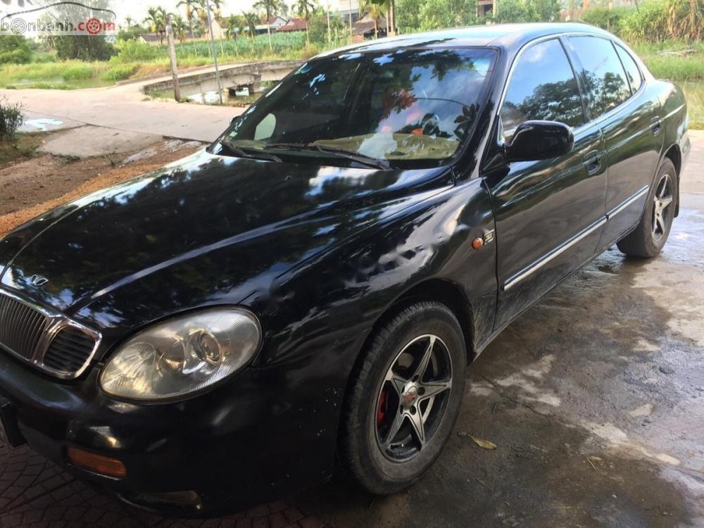 Daewoo Leganza 2001 - Bán Daewoo Leganza sản xuất 2001, màu đen, xe nhập  