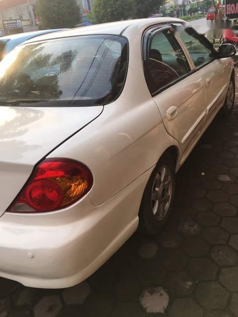 Kia Spectra MT 2004 - Cần bán Kia Spectra MT năm 2004, màu trắng, giá chỉ 105 triệu
