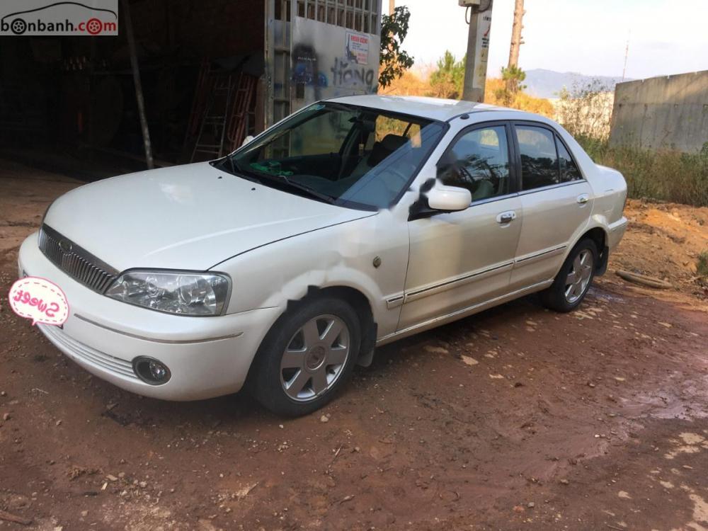 Ford Laser Ghia 1.8 2002 - Bán Ford Laser Ghia 1.8 2002, màu trắng, nhập khẩu  