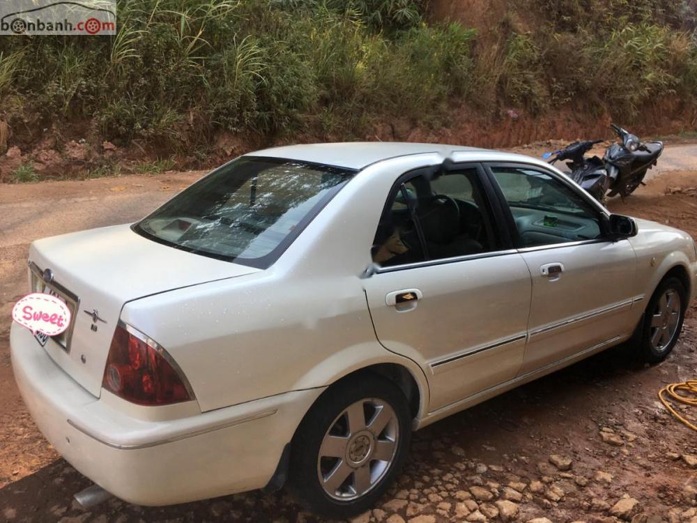 Ford Laser Ghia 1.8 2002 - Bán Ford Laser Ghia 1.8 2002, màu trắng, nhập khẩu  