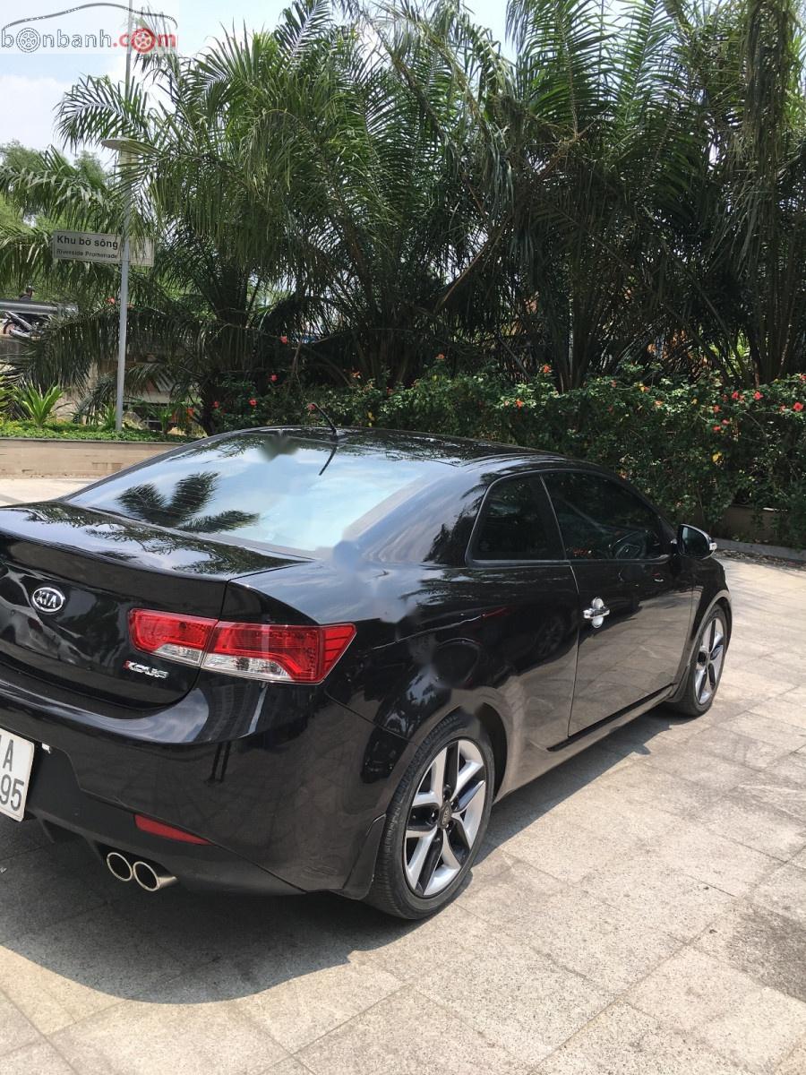 Kia Cerato  Koup 2010 - Bán ô tô Kia Cerato Koup sản xuất năm 2010, màu đen, nhập khẩu