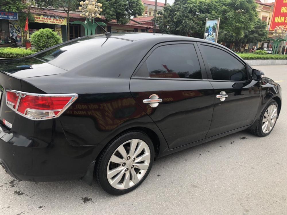 Kia Cerato AT 2009 - Cần bán Kia Cerato AT sản xuất 2009, màu đen, nhập khẩu