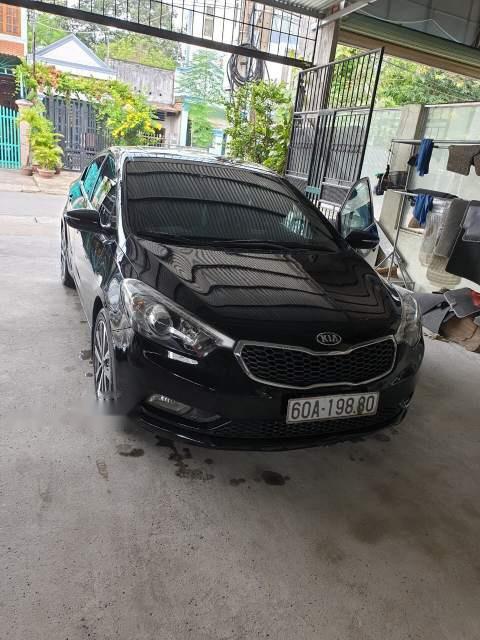 Kia K3  AT 2015 - Bán Kia K3 AT 2015, màu đen, xe nhập ít sử dụng