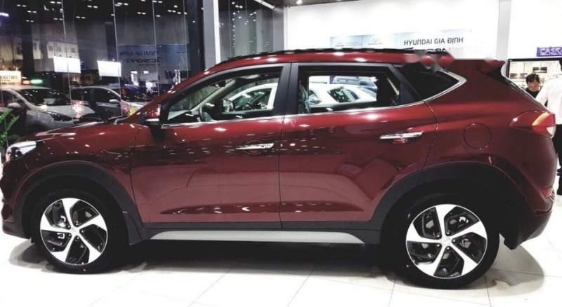 Hyundai Tucson 2014 - Cần bán gấp Hyundai Tucson sản xuất 2014, màu đỏ giá cạnh tranh