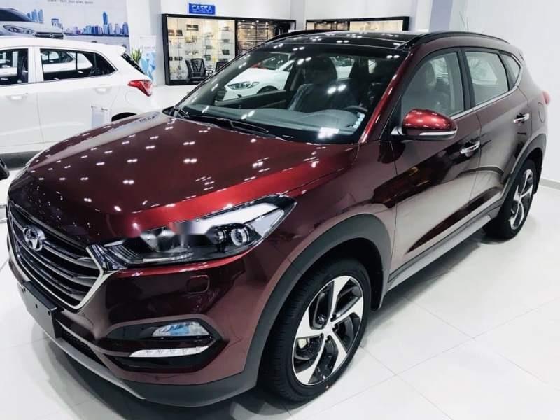 Hyundai Tucson 2014 - Cần bán gấp Hyundai Tucson sản xuất 2014, màu đỏ giá cạnh tranh