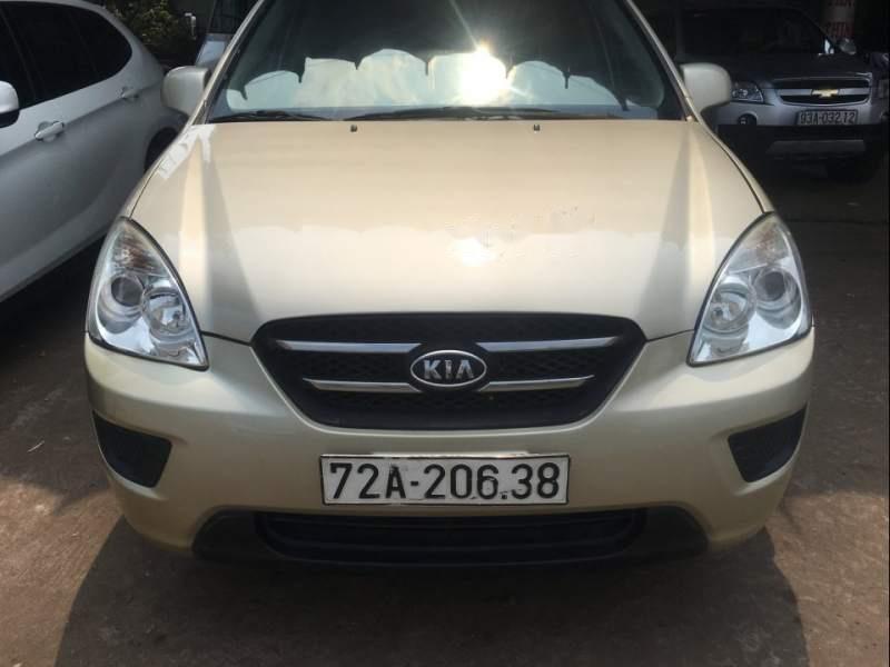 Kia Carens LX 2010 - Bán ô tô Kia Carens LX năm sản xuất 2010, màu vàng số sàn, giá 265tr