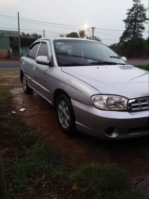 Kia Spectra   1.6   2004 - Cần bán Kia Spectra 1.6 sản xuất năm 2004, màu bạc