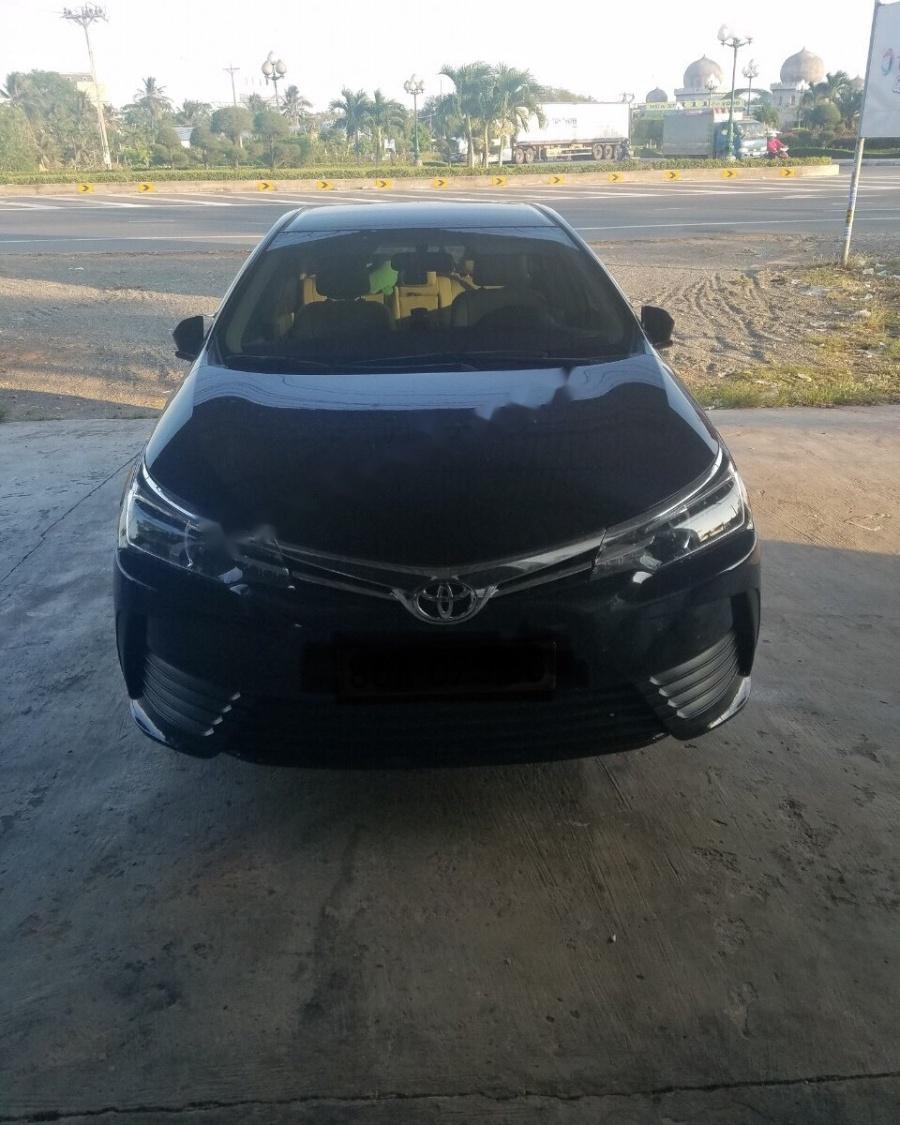 Toyota Corolla altis 2018 - Cần bán xe Toyota Corolla altis sản xuất năm 2018, màu đen 