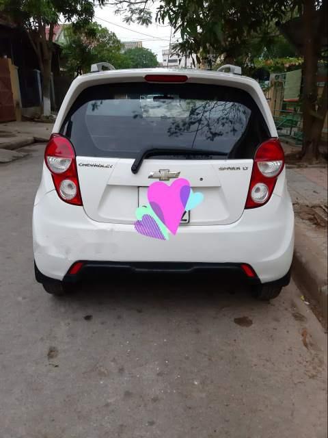 Chevrolet Spark LT 1.0 2014 - Cần bán Chevrolet Spark LT 1.0 đời 2014, màu trắng, nhập khẩu nguyên chiếc xe gia đình