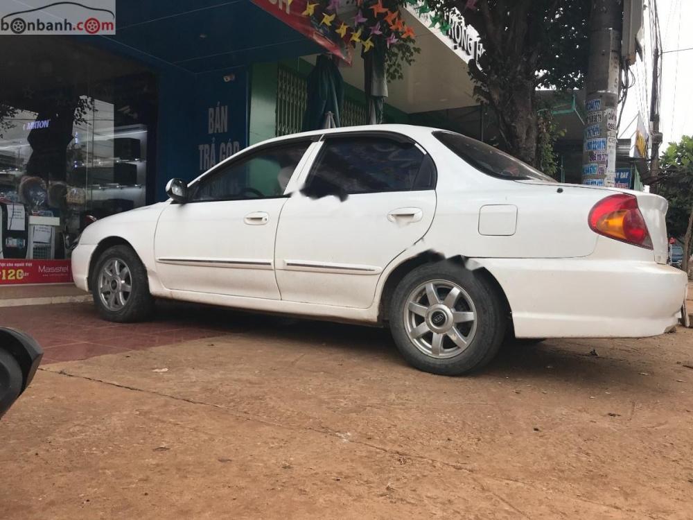 Kia Spectra 1.6 2004 - Bán Kia Spectra 1.6 đời 2004, màu trắng