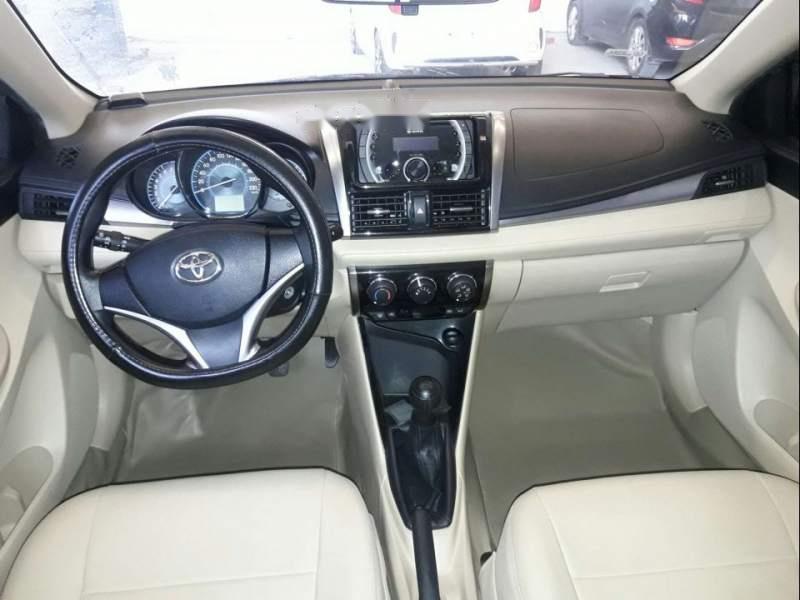 Toyota Vios  1.5 MT 2015 - Bán Toyota Vios 1.5 MT năm sản xuất 2015, màu vàng