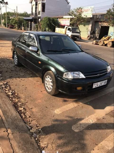 Ford Laser   2001 - Cần bán gấp Ford Laser 2001, màu đen, xe gia đình, 125tr