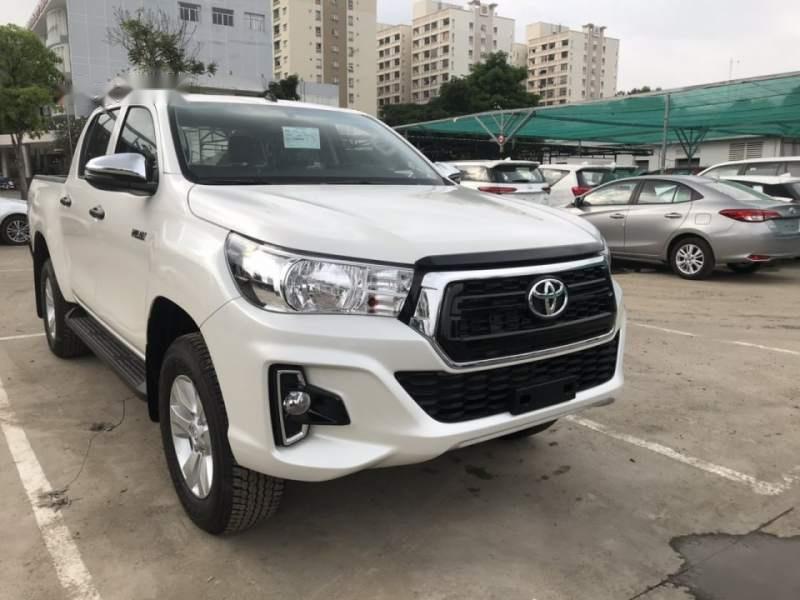 Toyota Hilux 2.4E 4x2 AT 2019 - Bán xe Toyota Hilux AT 2019, màu trắng, nhập khẩu, 695 triệu