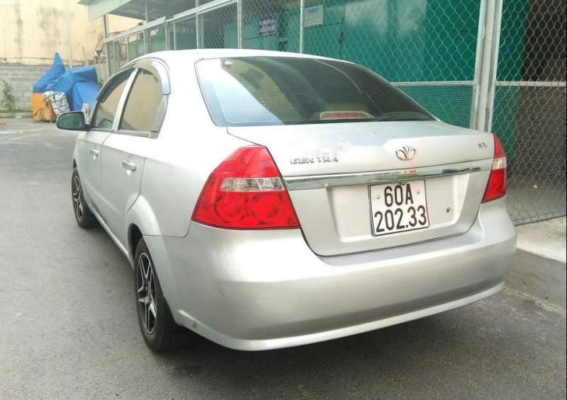 Daewoo Gentra MT 2010 - Cần bán xe Daewoo Gentra MT sản xuất 2010, màu bạc 