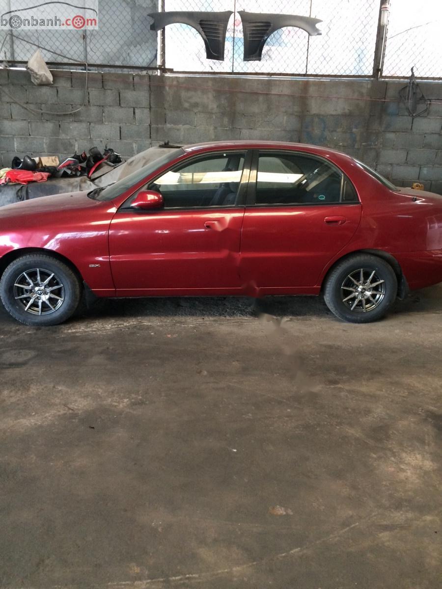 Daewoo Lanos 2002 - Bán Daewoo Lanos đời 2002, màu đỏ, xe còn mới toanh, sơn zin 90%