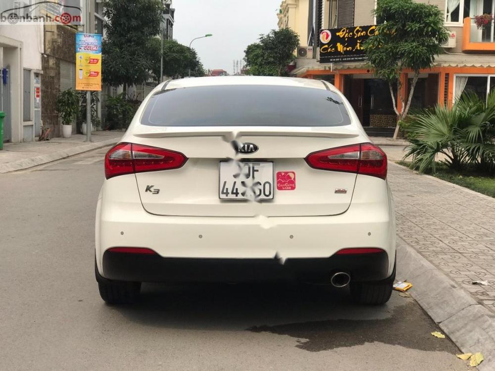 Kia K3 2.0 AT 2014 - Bán Kia K3 2.0 2014 màu trắng, nội thất đen, odo chạy chuẩn 44.000Km