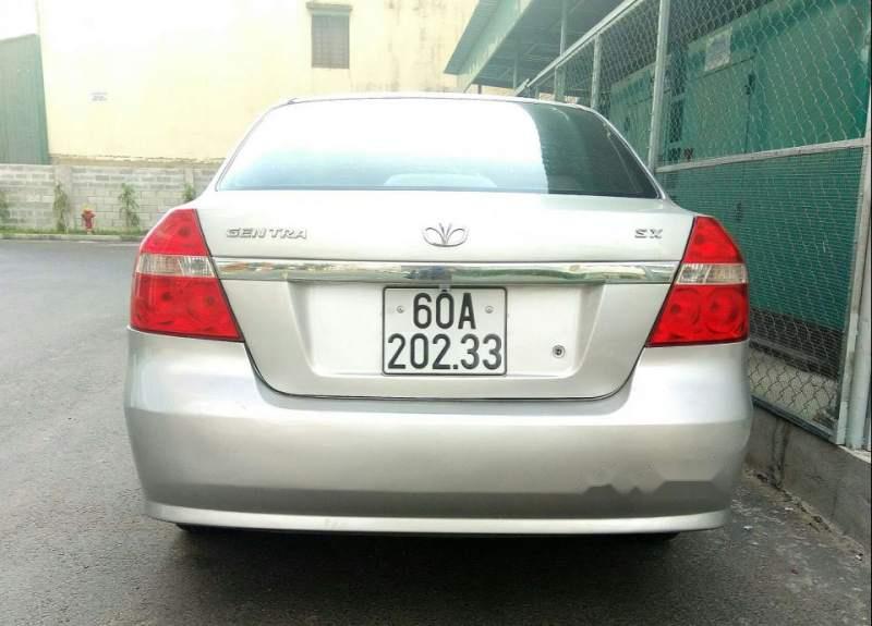 Daewoo Gentra MT 2010 - Cần bán xe Daewoo Gentra MT sản xuất 2010, màu bạc 