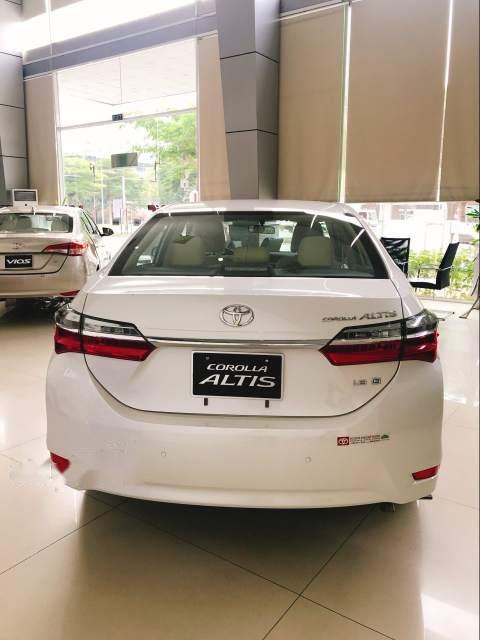 Toyota Corolla altis  1.8 CVT  2019 - Cần bán xe Toyota Corolla Altis 1.8 CVT đời 2019, màu trắng, 761 triệu