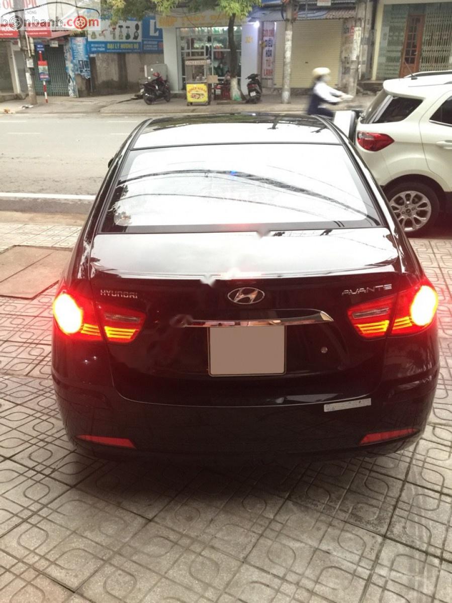 Hyundai Avante 1.6 MT 2013 - Bán xe Hyundai Avante 1.6 MT năm 2013, màu đen như mới