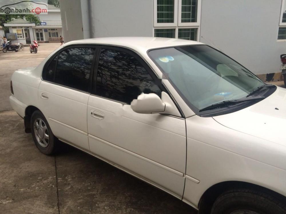 Toyota Corolla 1996 - Bán xe Toyota Corolla sản xuất 1996, màu trắng, nhập khẩu, giá chỉ 125 triệu