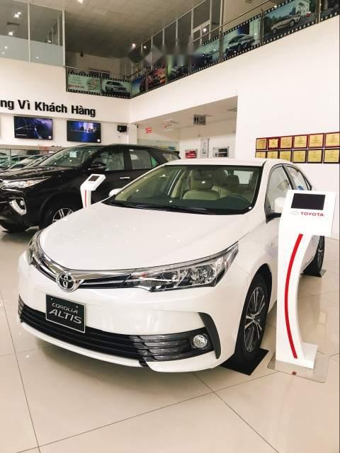 Toyota Corolla altis  1.8 CVT  2019 - Cần bán xe Toyota Corolla Altis 1.8 CVT đời 2019, màu trắng, 761 triệu