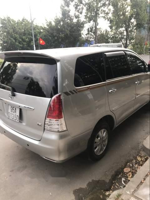 Toyota Innova  G 2009 - Cần bán gấp Toyota Innova G 2009, màu bạc còn mới, giá 395tr