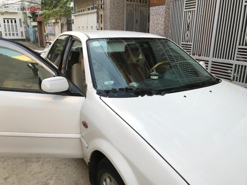 Ford Laser Delu 1.6 MT 2000 - Cần bán xe Ford Laser Delu 1.6 MT đời 2000, màu trắng xe gia đình