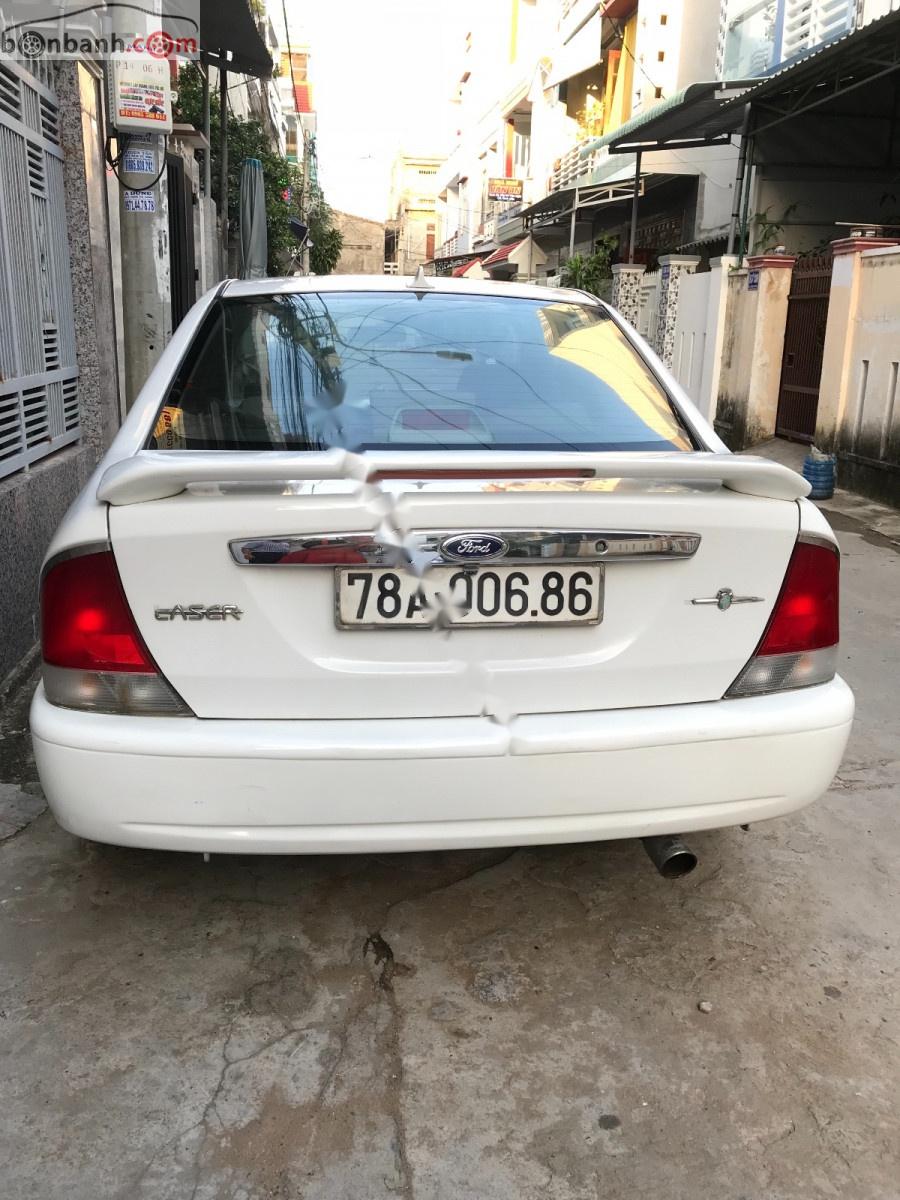 Ford Laser Delu 1.6 MT 2000 - Cần bán xe Ford Laser Delu 1.6 MT đời 2000, màu trắng xe gia đình