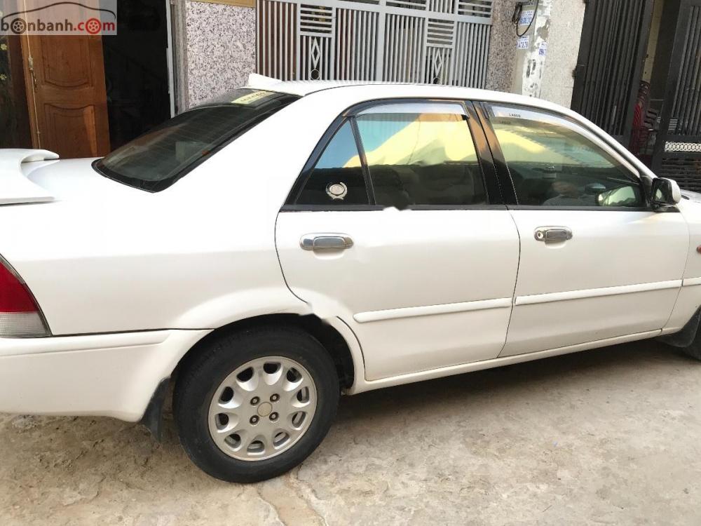 Ford Laser Delu 1.6 MT 2000 - Cần bán xe Ford Laser Delu 1.6 MT đời 2000, màu trắng xe gia đình