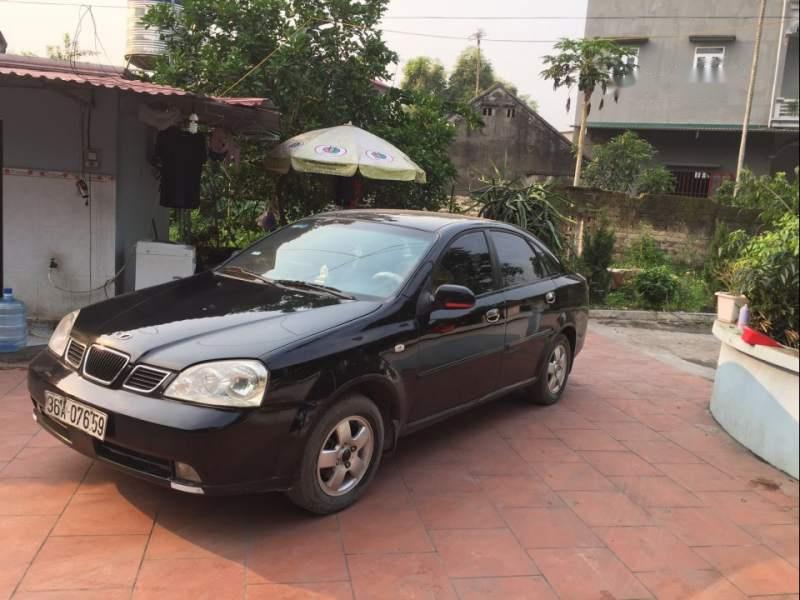 Daewoo Lacetti   2004 - Cần bán lại xe Daewoo Lacetti 2004, màu đen